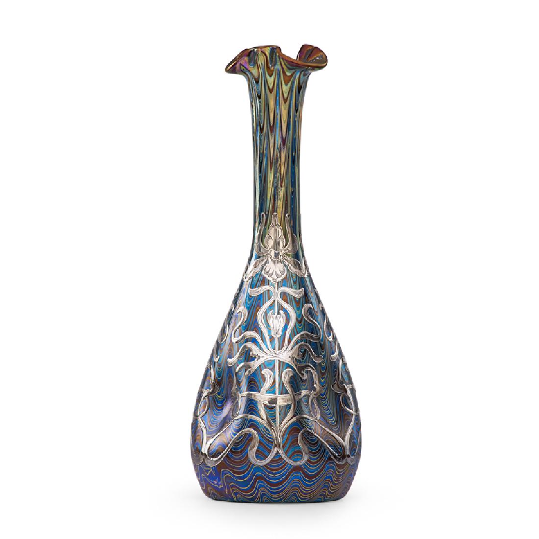 LOETZ Phänomen vase with overlay: LOETZ Phänomen vase (PG 6893) with ruffled rim and silver overlay of irises, Austria, ca. 1900 Etched Loetz Austria, silver stamped WEBSTER & CO Piccadilly Sterling silver 9 3/4" x 3 1/2"