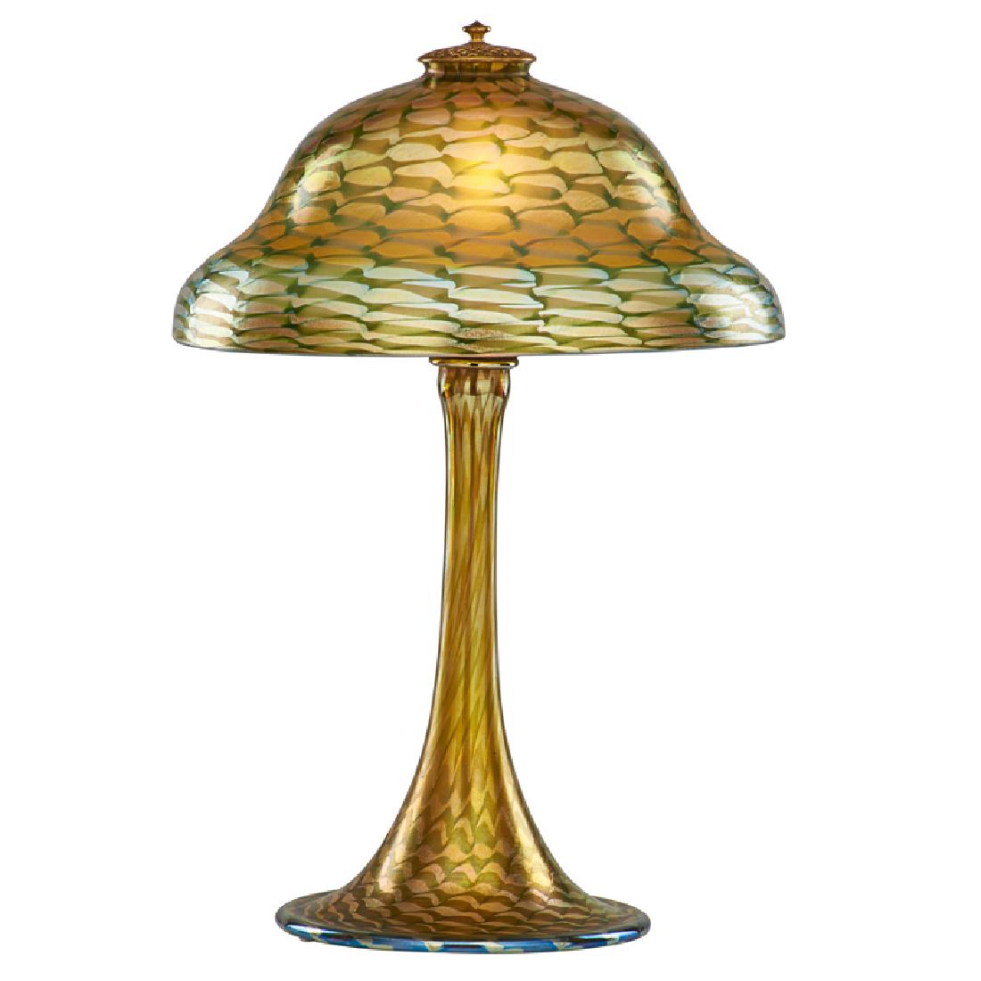 TIFFANY STUDIOS Fine Favrile glass lamp: TIFFANY STUDIOS Fine and rare Favrile Wave pattern lamp, New York, early 20th C. Blown glass, gilt metal, single socket Shade etched L.C.T. Favrile, base etched L.C. Tiffany - Favrile 17 1/2" x 12" Pr