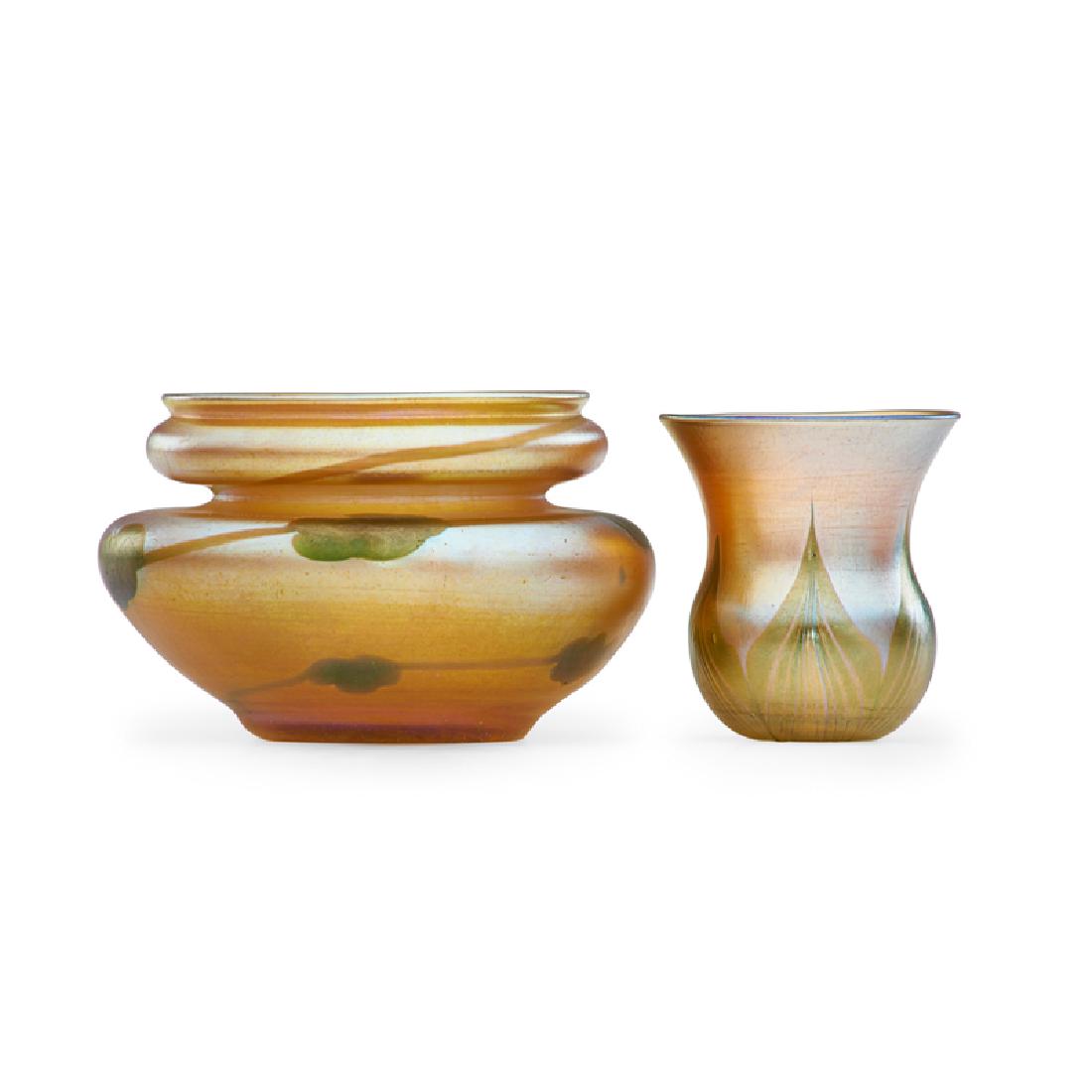 TIFFANY STUDIOS Two Favrile vases: TIFFANY STUDIOS Small gold Favrile vase with vine pattern and gold Favrile cabinet vase with pulled-feather pattern, New York, ca. 1897/99 Blown glass Both signed and numbered 2 3/4" x 4 1/2", 2 1/2" 