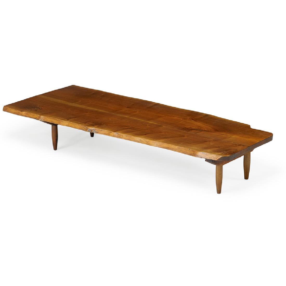 PHIL POWELL Custom low coffee table: PHIL POWELL (1919 - 2008) Custom low coffee table, New Hope, PA, 1960s Figured walnut Unmarked 12" x 31" x 72 1/2" Provenance: Rago, Modern, October 2010, lot 703
