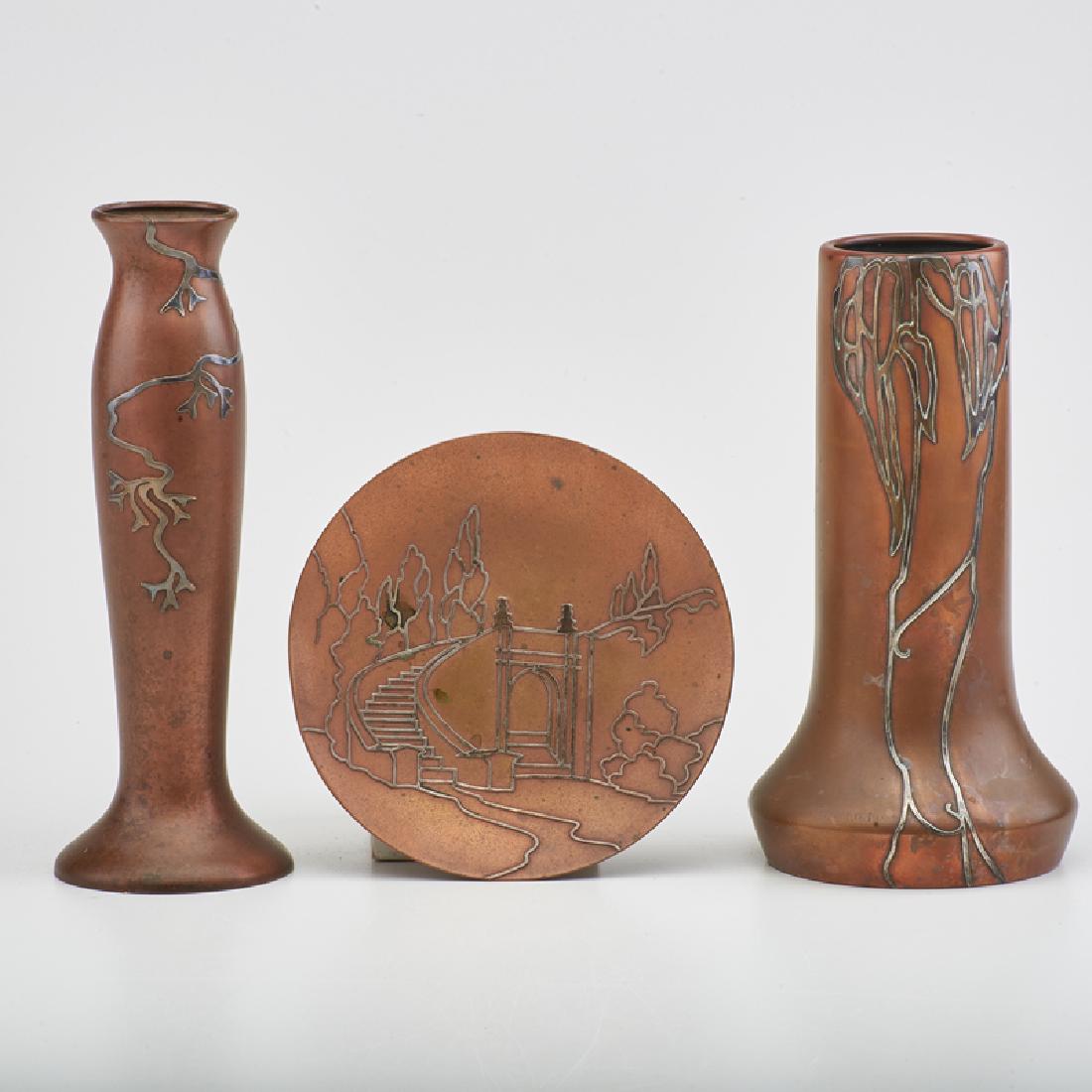 HEINTZ: Three Sterling-on-Bronze pieces with foliate or scenic overlay decoration: corseted and bud vases, and card tray, Buffalo, NY, early 20th c. All marked Tallest: 9" x 3" dia.