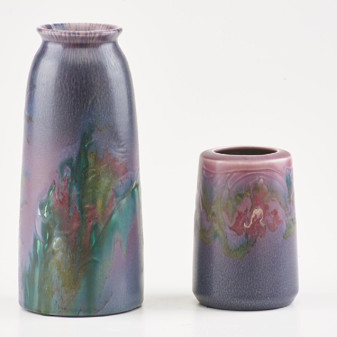 ELIZABETH LINCOLN; ROOKWOOD: Two Decorated Mat vases, Cincinnati, OH, 1920/21 Both with flame mark, date, model, and artist's cipher Taller: 9 7/8" x 4 1/2" dia.