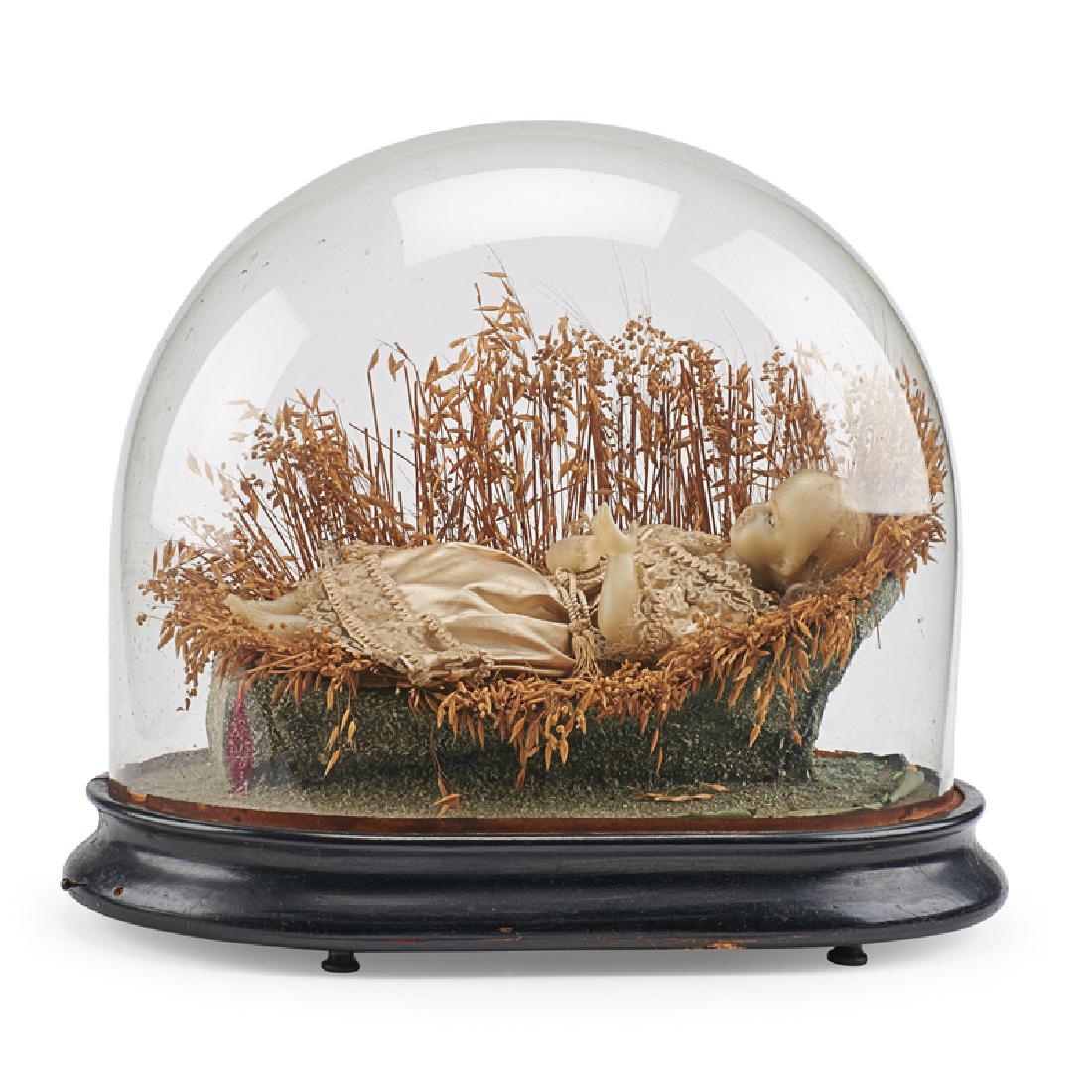 19TH C. MECHANICAL MUSIC BOX: Depicting the baby Moses carved in wax and dressed in silk, lying in his basket under a glass dome ca. 1880 On base: 19" x 17" Provenance: Collection of Bernard Boutet de Monvel Sotheby's Paris, 5-6 A