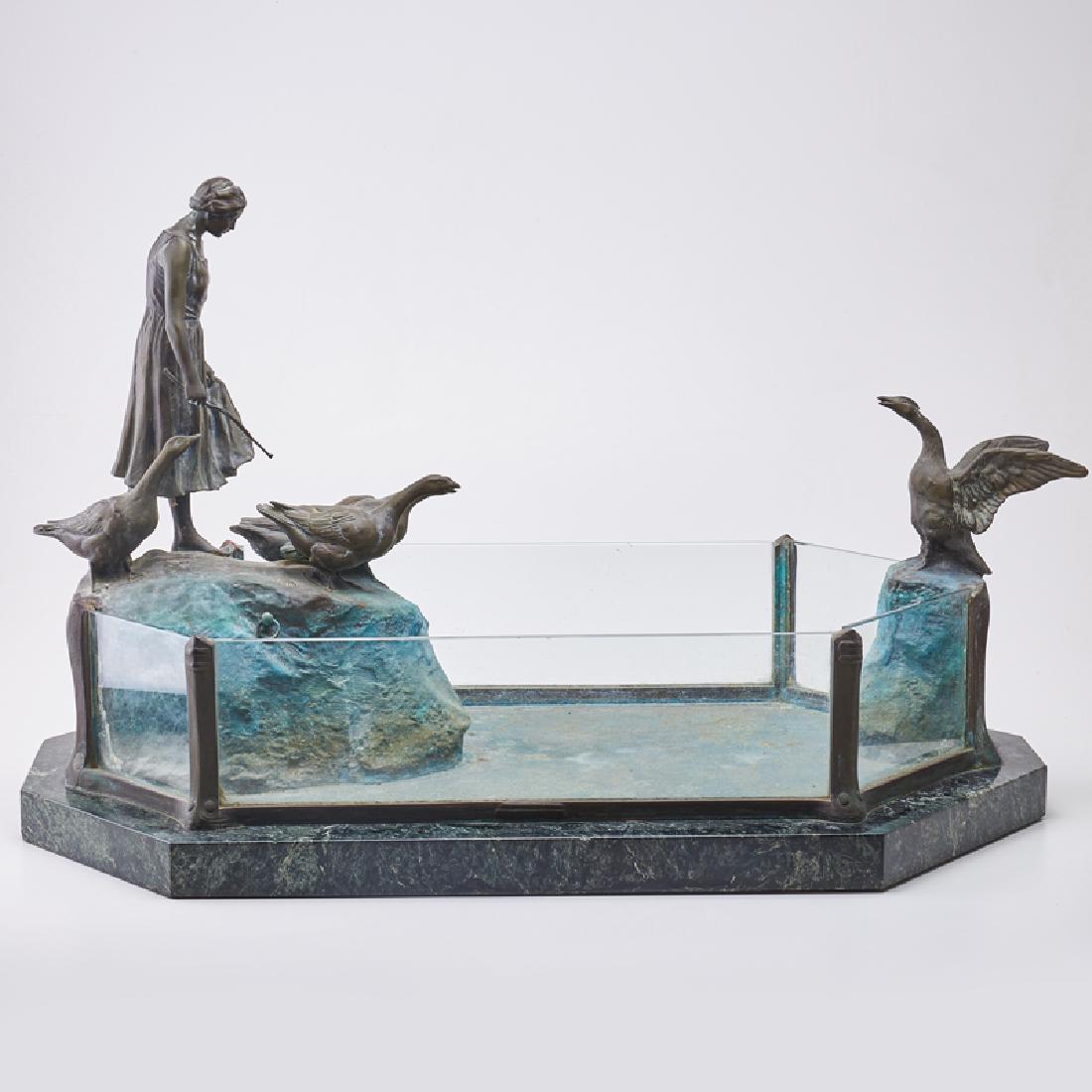 FRIEDRICH GORNIK (Austrian, 19th/20th Century): Reptile pond/terrarium, with maiden and geese Bronze, glass surround, marble base Signed 20" x 31 3/4" x 19 3/4"