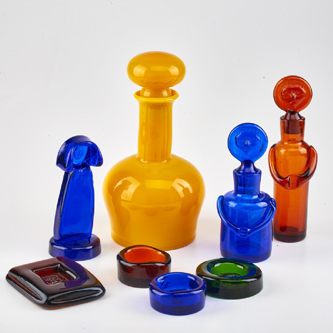 ERIK HOGLUND (1932-1998); BODA: Eight pieces: three decanters (two figural), sculpture, and four ashtrays, Sweden, 1960s Glass Tallest: 10 3/4" x 6" dia.
