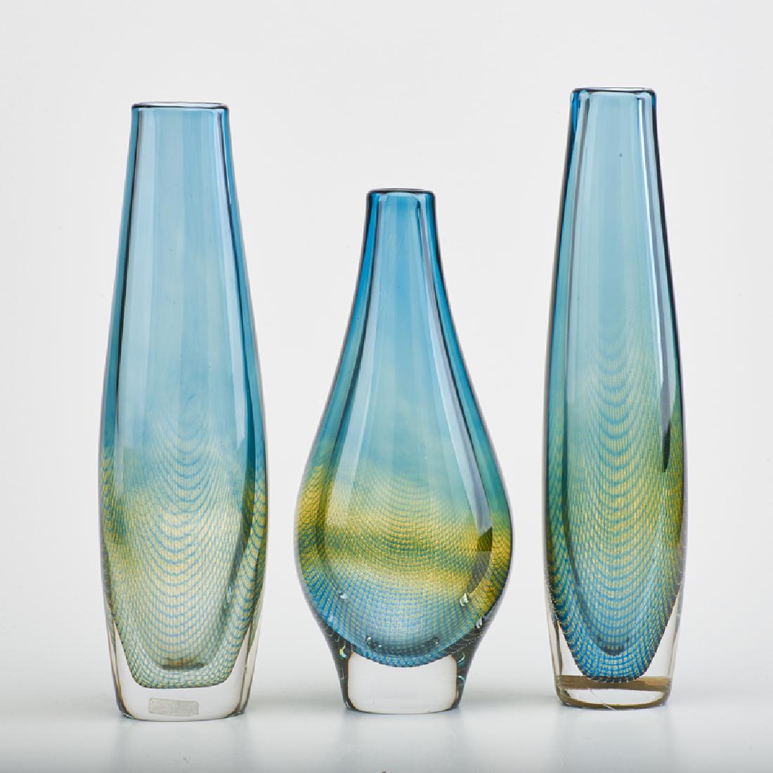 SVEN PALMQVIST (1906-1984); ORREFORS: Three "Kraka" vases, Sweden, 1960s Glass Etched marks and original sticker labels Tallest: 12" x 3" x 2 1/4"