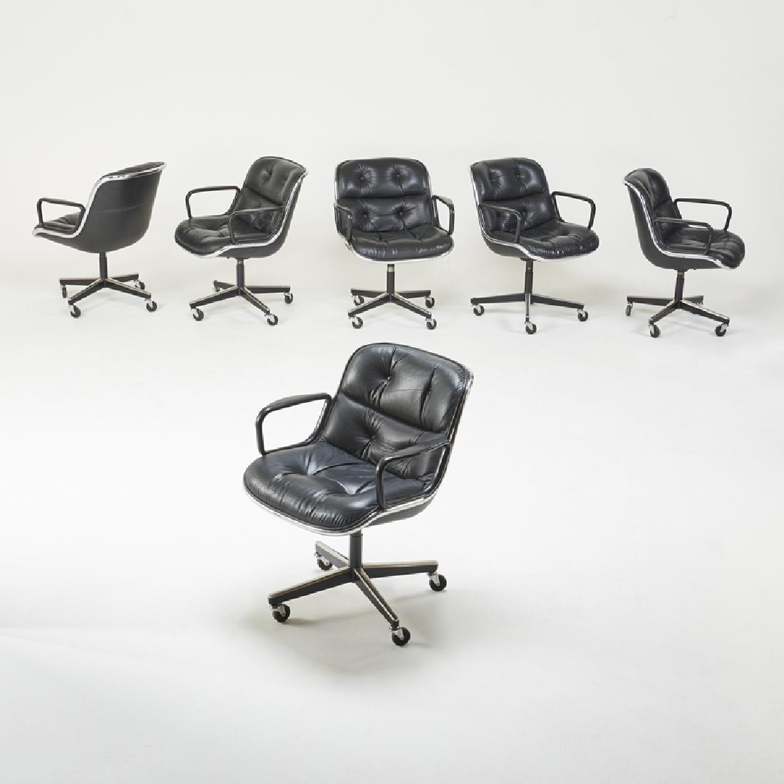 CHARLES POLLOCK; KNOLL INTERNATIONAL: Set of six rolling office chairs, NY, 1970s Cast resin, chromed and enameled steel, leather, casters Upholstery labels 32 1/2" x 26 1/2" x 26"