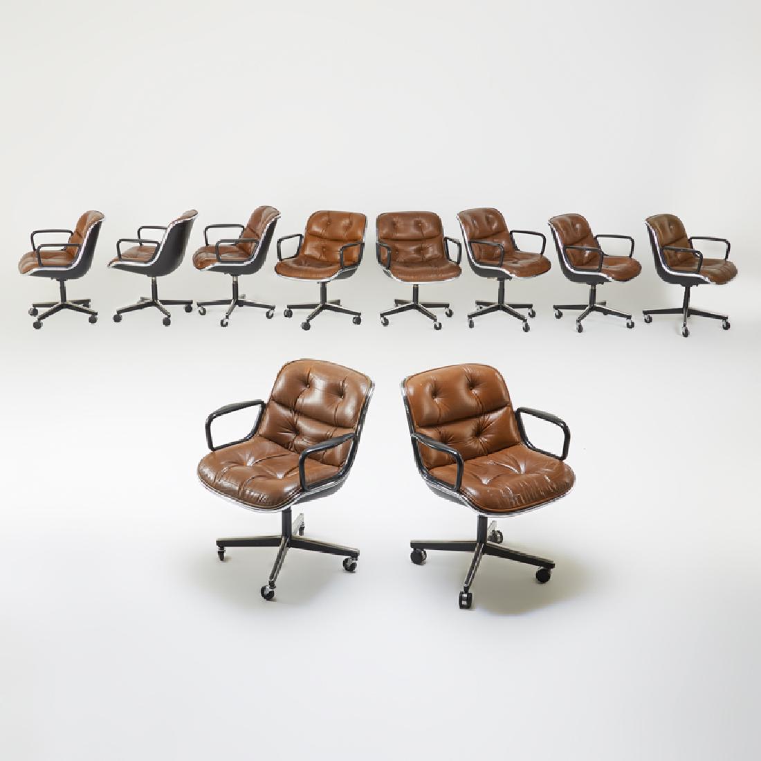 CHARLES POLLOCK; KNOLL INTERNATIONAL: Assembled set of ten rolling office chairs, NY, 1970s Cast resin, chromed and enameled steel, leather, casters Upholstery labels 32 1/2" x 26 1/2" x 26"