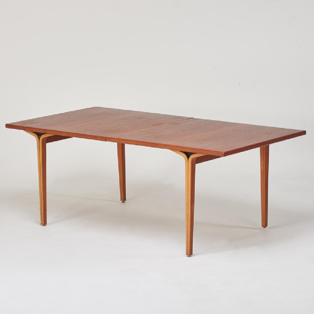 BILL STEPHENS; KNOLL INTERNATIONAL: Extension dining table, New York, 1970s Teak Knoll label 29" x 76" x 40", two leaves: 19" each. Provenance: Estate of Marshall Churner, Vice President of Lightolier, Franklin Lakes NJ.