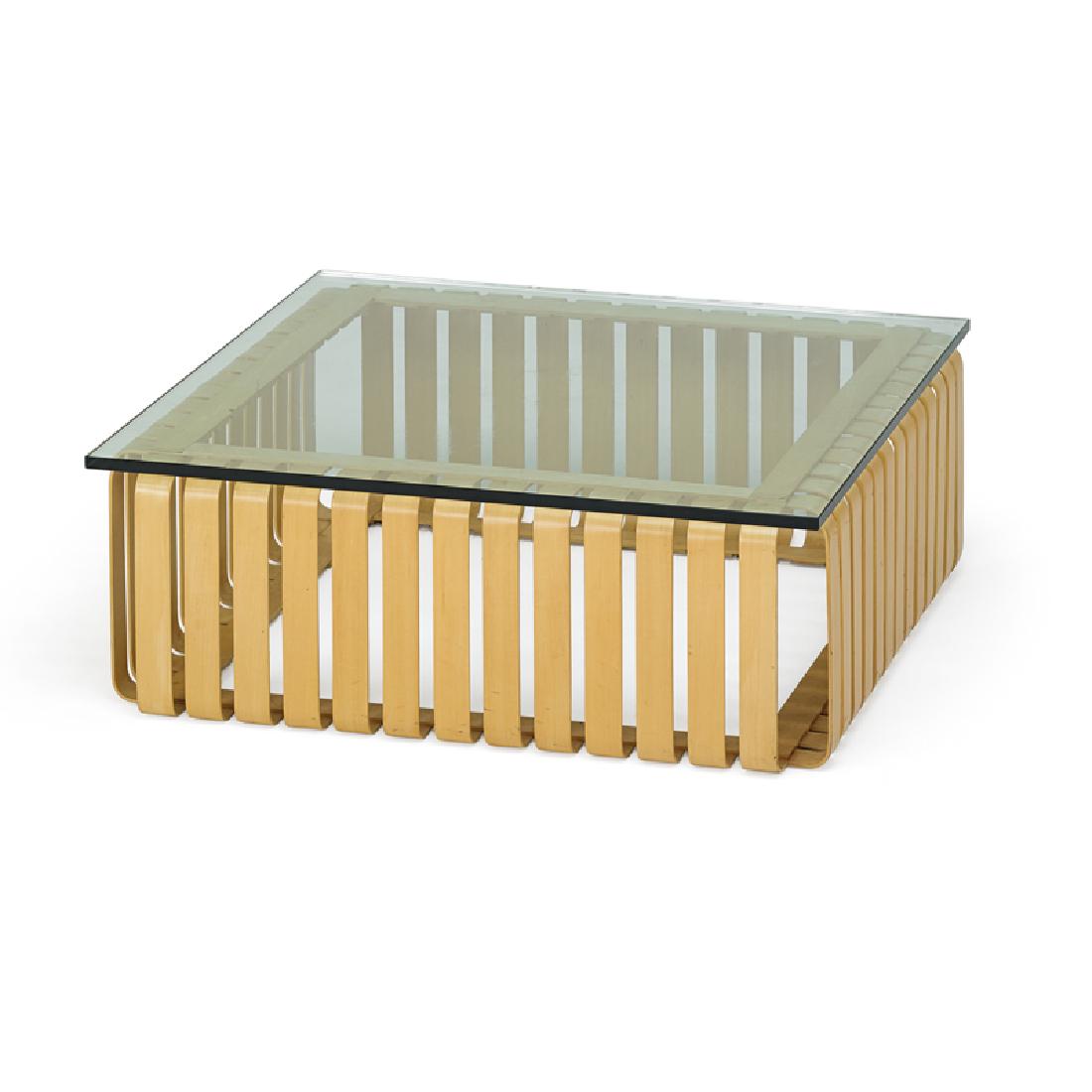 FRANK GEHRY; KNOLL INTERNATIONAL: Bent maple "Icing" table with glass top, New York, 1998 Branded "Made in USA 10/98 Gehry/Knoll" 14 1/2" x 40" sq.