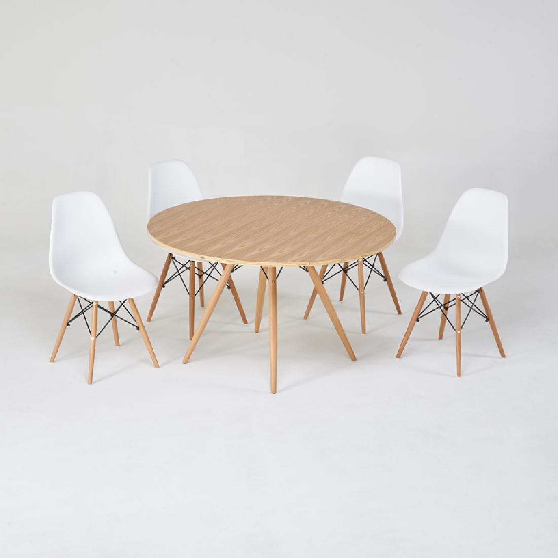 STYLE OF CHARLES & RAY EAMES: Dining set: dowel-leg dining table and four side chairs Turned wood, laminated plywood, enameled steel, plastic Unmarked Table: 28" x 47" dia., chairs: 32 1/2" x 18 1/2" x 22"