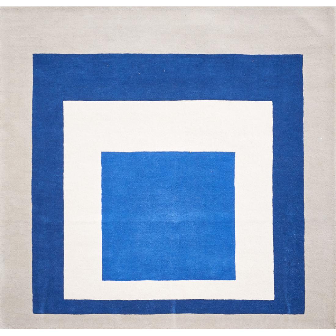 AFTER JOSEF ALBERS (American/German, 1888-1976): Hand-knotted wool rug "Hommage to the Square (Blue, White, Grey)," 2014 Label to verso Edition 45/150 69" x 69"