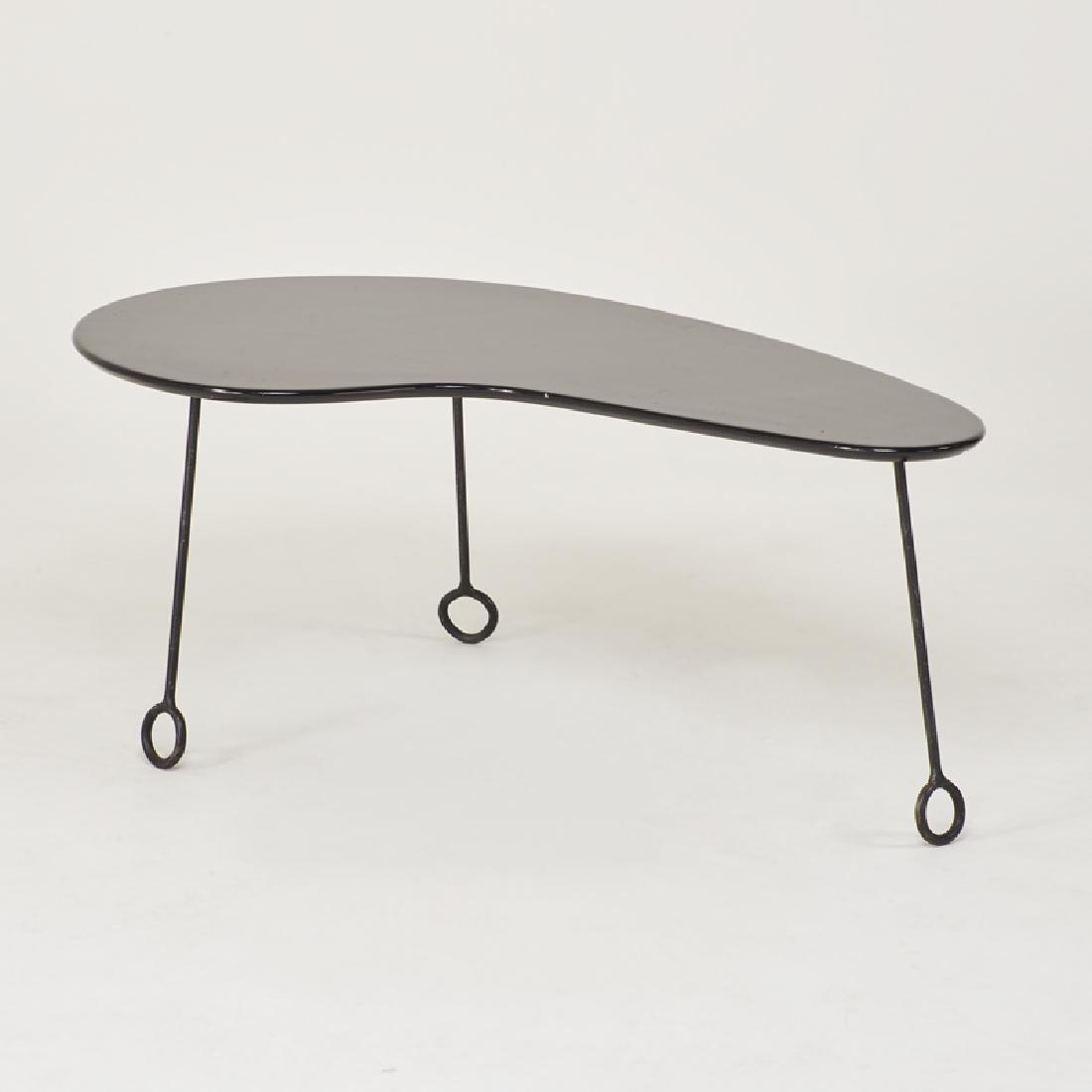 STYLE OF JEAN ROYERE: Coffee table, ca. 1990s Enameled wood and steel Unmarked 19" x 48 1/2" x 28 1/2"