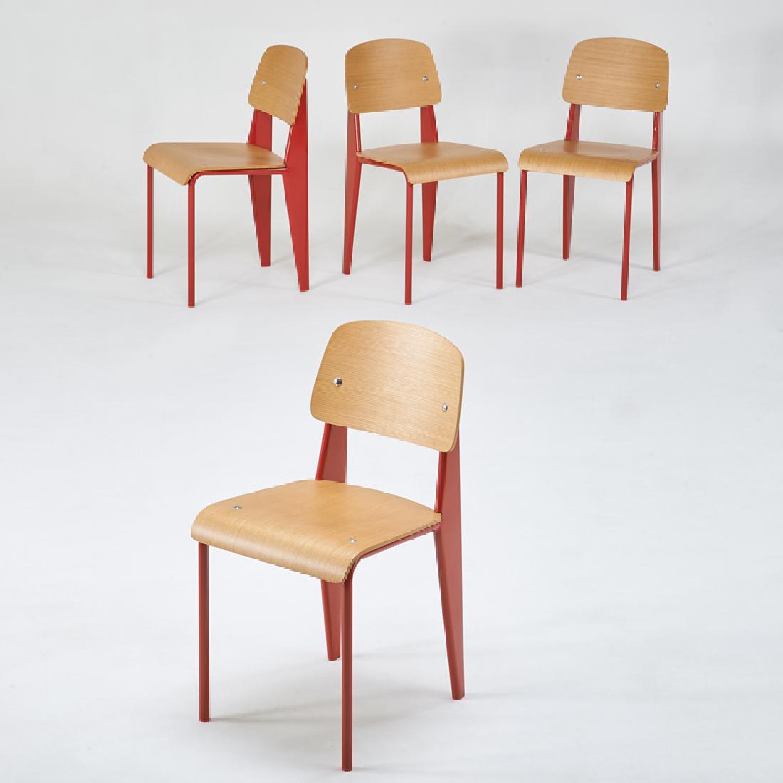 STYLE OF JEAN PROUVE: Set of four Standard chairs, 2000s Enameled steel, oak, laminated plywood Unmarked 32" x 16" x 19 1/2"