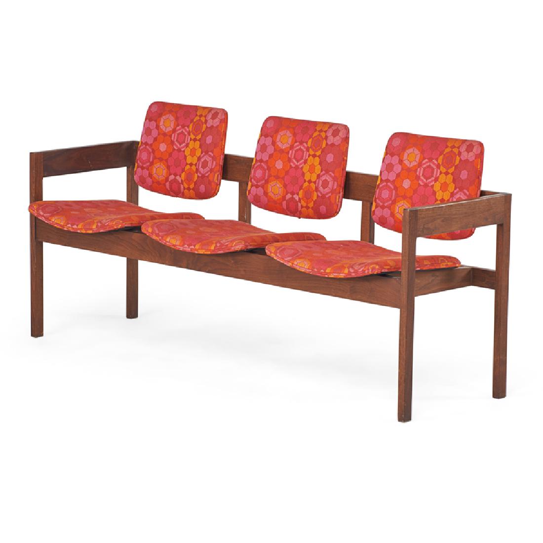 JOHN STUART: Three-seat bench, USA, mid 20th c. Walnut, upholstery Manufacturer label 31" x 65" x 23"