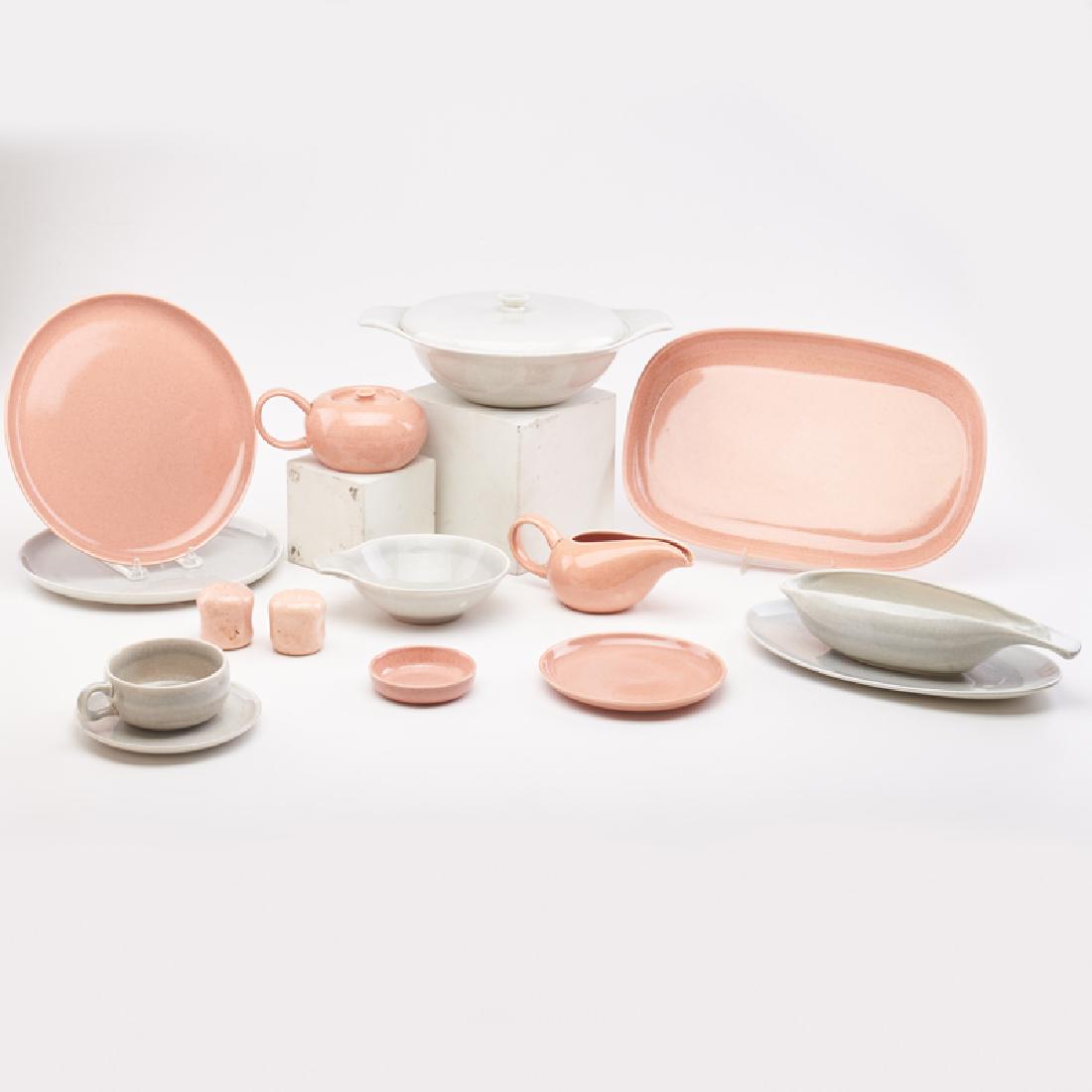 RUSSEL WRIGHT (1904 - 1976); STEUBENVILLE POTTERY: 56-piece "American Modern" serving set in coral and gray: 7 dinner plates (10"), 9 bread plates (6 1/8") , 2 small oval serving plates (11"), 1 rectangular platter (13 1/2"), 1 sugar, 2 creamers, 1 gr
