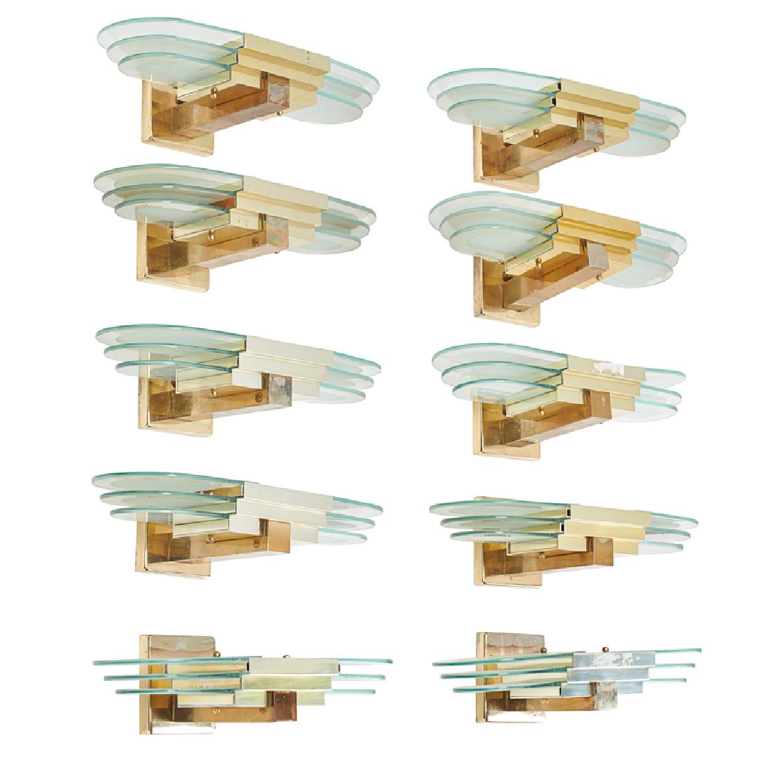 ART DECO STYLE: Ten wall sconces, 20th c. Brass, clear and frosted glass Unmarked Each: 17" x 8 5/8" x 5"