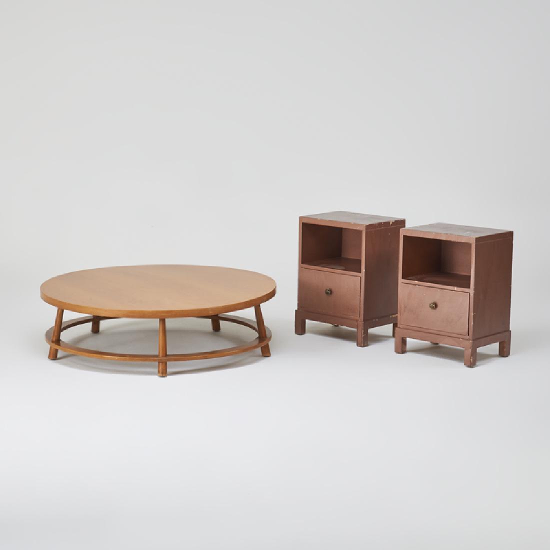 T.H. ROBSJOHN-GIBBINGS; WIDDICOMB: Circular coffee table and pair of nightstands, Grand Rapids, MI, 1950s Bleached mahogany, enameled wood, patinated metal Fabric labels Table: 13 1/2" x 48" dia., nightstands: 26" x 18" x 15"