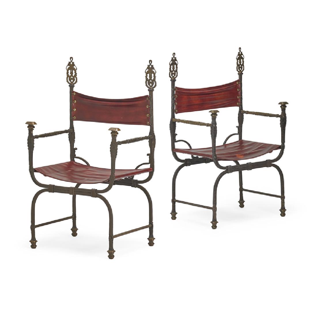 PAIR OF OSCAR BACH CHAIRS: Bronze and iron frames with later red leather backs and seats, USA, ca. 1924 43" x 28 1/2" x 17 1/2" each