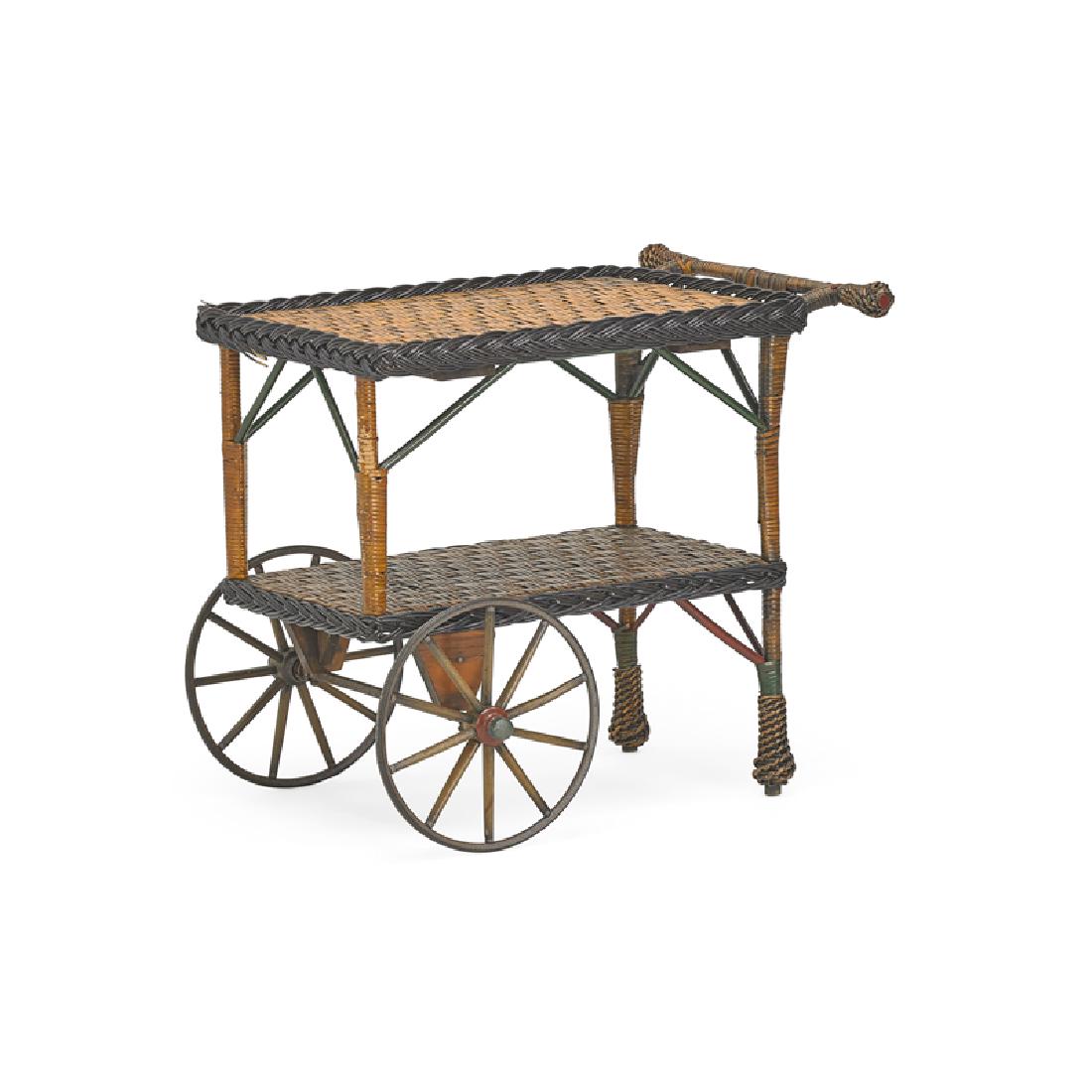 HEYWOOD WAKEFIELD (Attr.) RATTAN TEA TROLLEY: With metal wheels, USA, first half 20th c. 28 1/2" x 31 1/2" x 23"