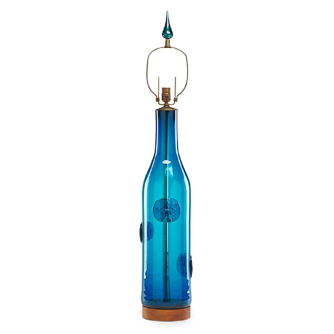 BLENKO GLASS LAMP: Cobalt blue with applied medallions, Milton, WV, 20th c. Marked with metal label To top of finial: 46 3/4"