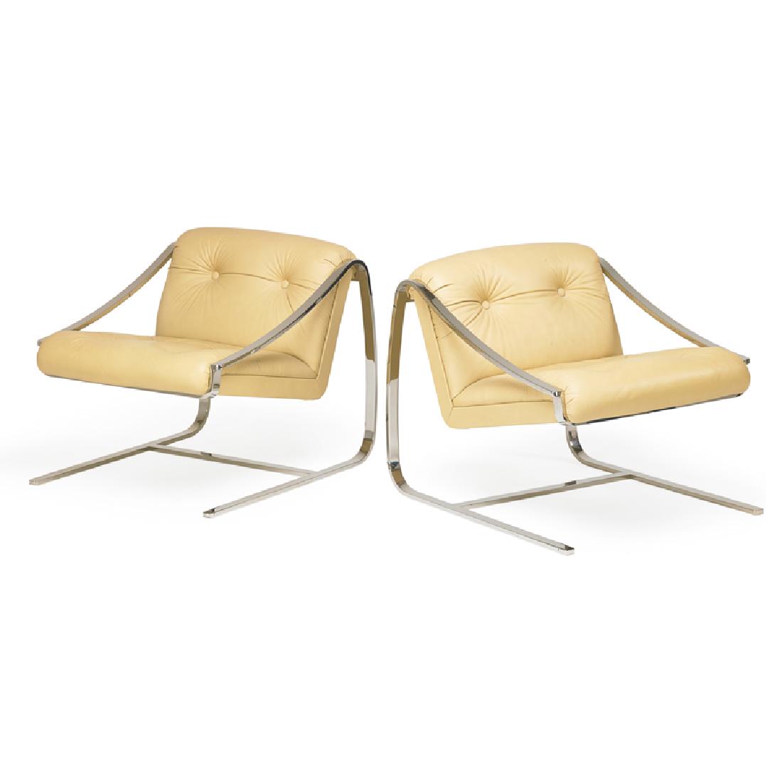 BRUETON PAIR OF LOUNGE CHAIRS: Stainless steel, leather, USA, ca. 1980s Upholstery labels 29" x 30" x 34 1/2"