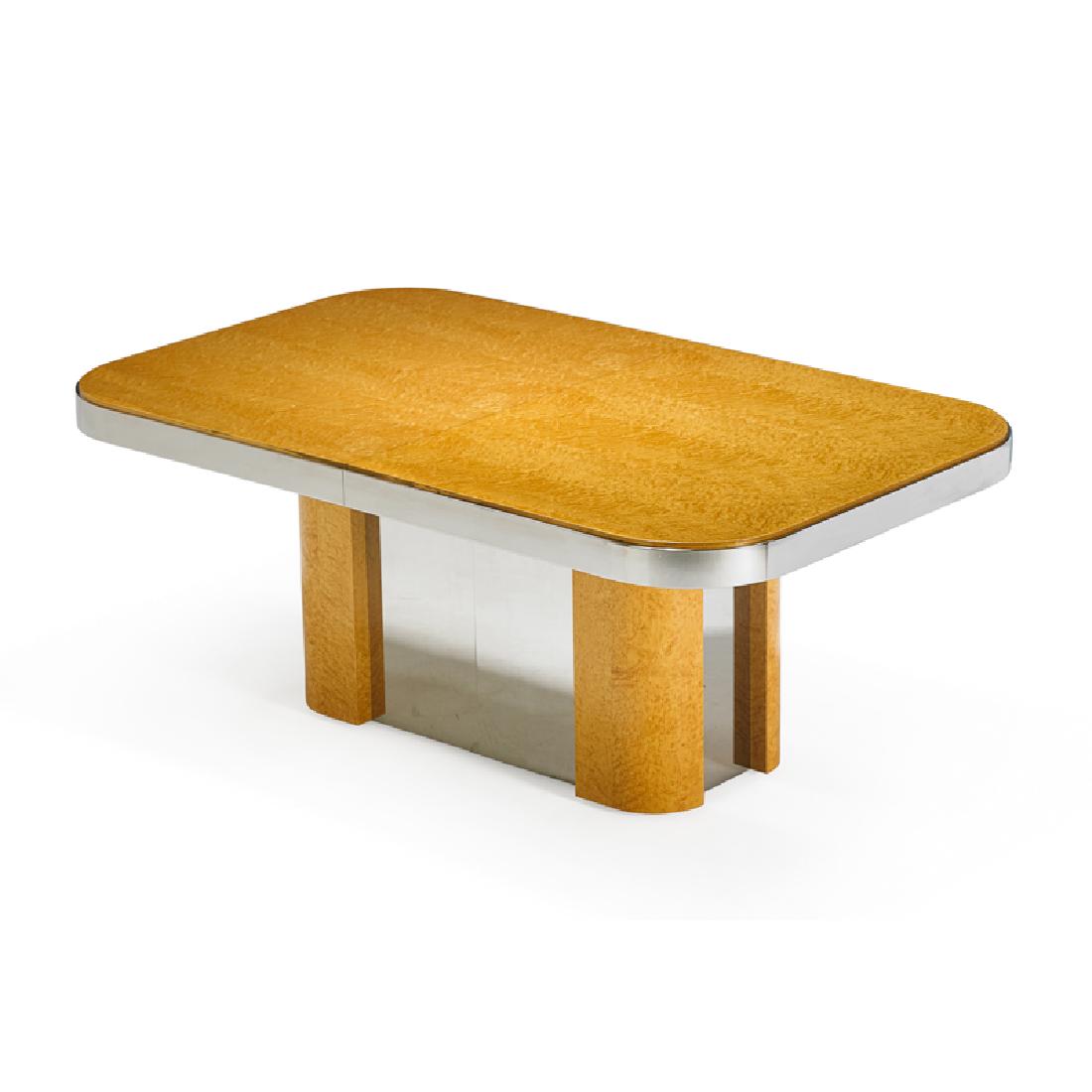 BRUETON DINING TABLE: Curly maple, polished stainless steel, USA, late 20th c. Unmarked 29 1/2" x 72" x 44", two leaves: 20" ea.