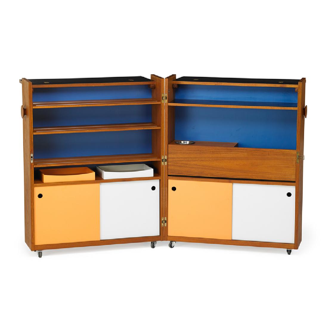 ERIK BUCK FOR DYRLUND FOLDABLE BAR CART: Teak, enameled masonite, laminate, brass, stainless steel, Denmark, 1960s Danish control label Closed: 46" x 36" x 20"