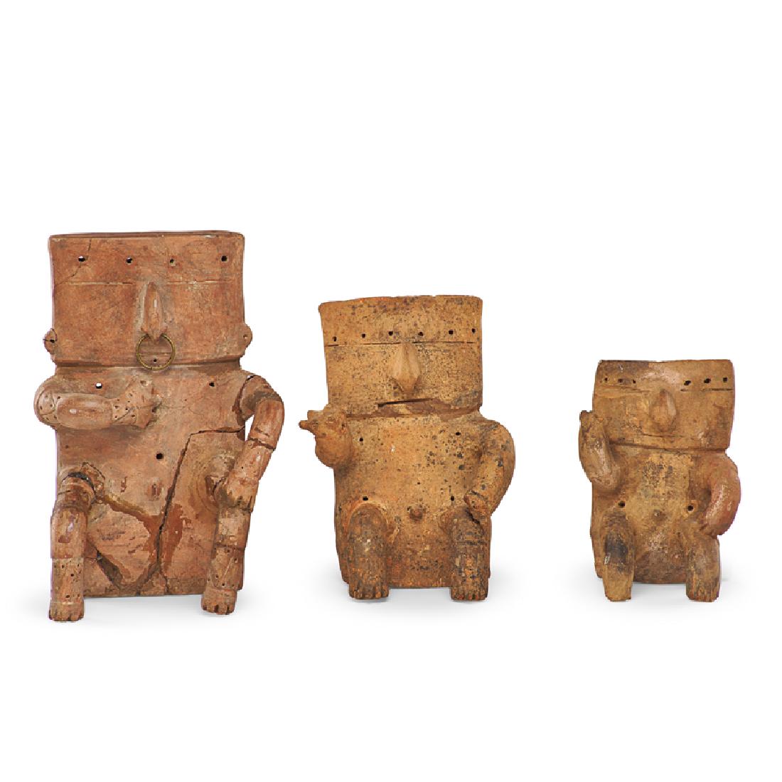 MUISCA/QUIMBAYA CIVILIZATION EARTHENWARE FIGURES: Depicting a mother and two sons, Columbian, 500-1000 BCE Largest: 10 7/8"