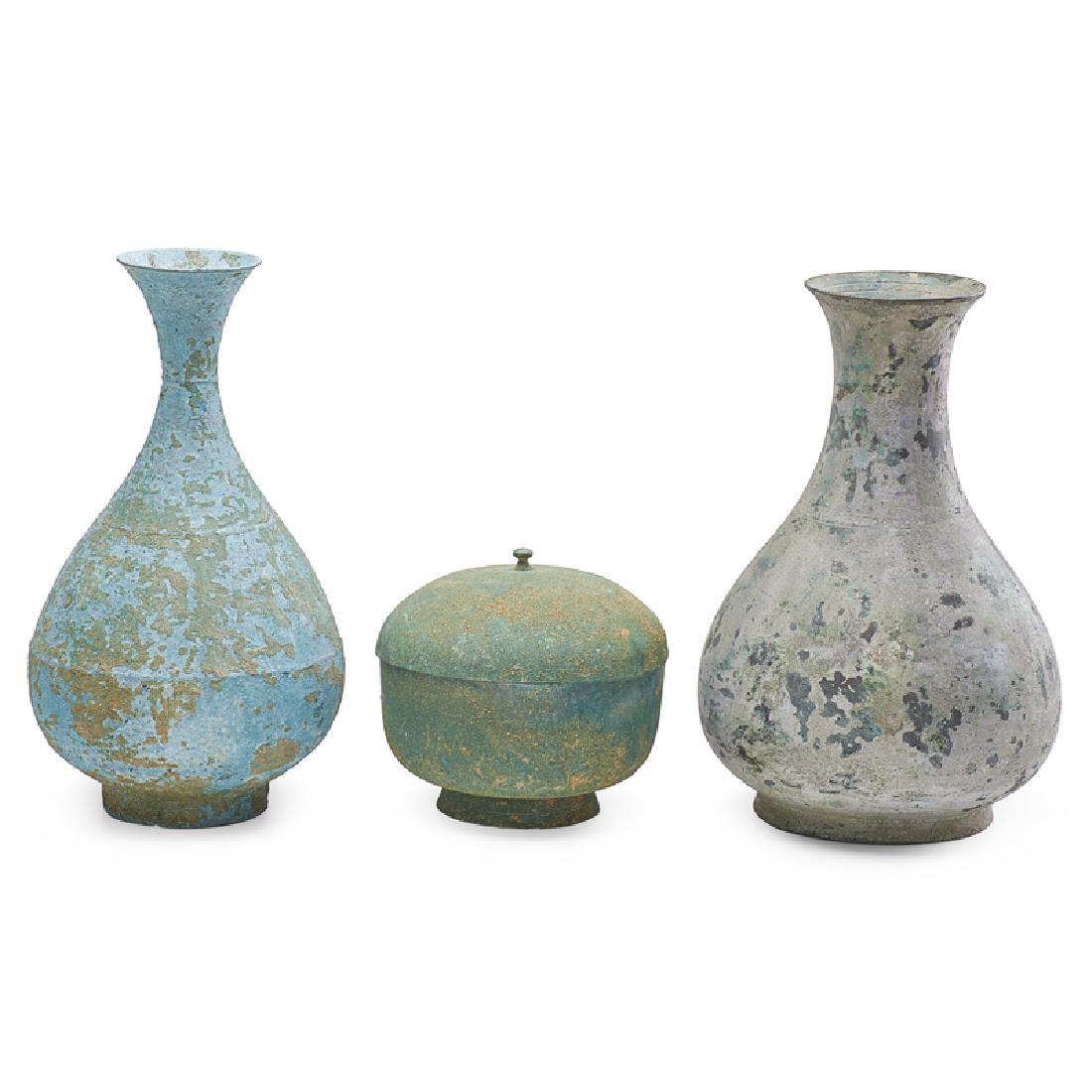 KOREAN BRONZE VESSELS: Three: Covered bowl and vases in two sizes, Goryeo period, 12th/13th c. Largest: 11 3/4" x 7" dia. Provenance: Collection of Hellen & Joe Darion, New York