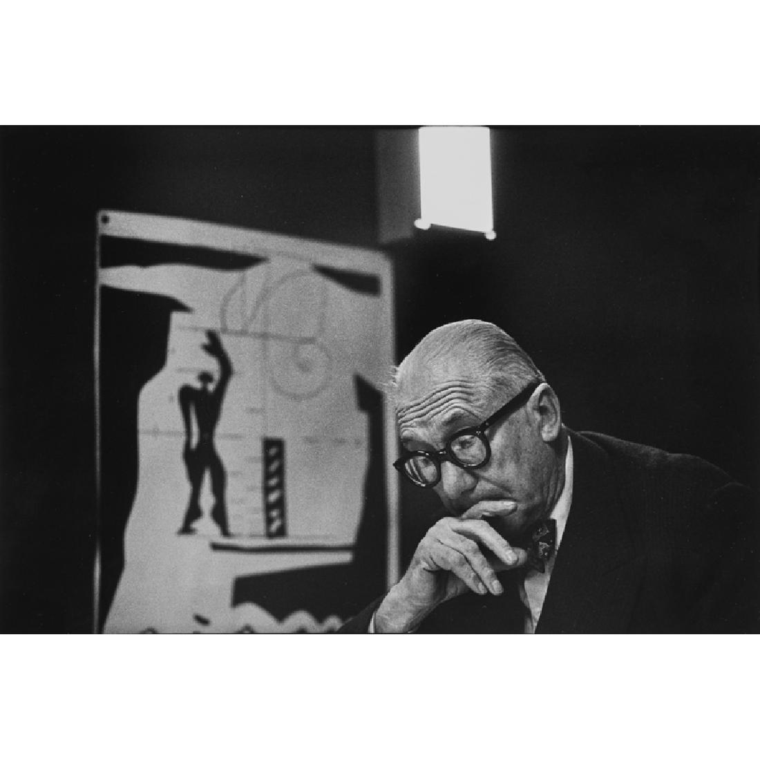 René Burri (Swiss, 1933-2014): Le Corbusier, Rue de Sèvres, Paris, 1959 (printed 2000) Gelatin silver print (framed) Signed, titled and dated 15 1/2" x 19 3/4" (sheet) Provenance: Peter Fetterman Gallery, Santa Monica (label to ve