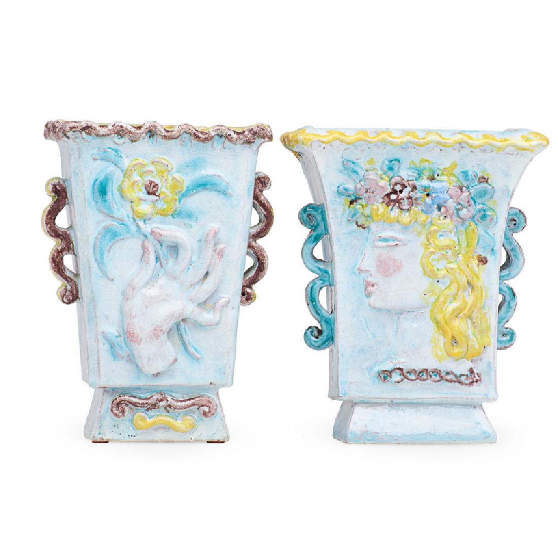 RENE BUTHAUD Two faience vases: RENE BUTHAUD (1886 - 1986) Two faience vases with female portrait, flowering branch, and hand holding flowers, France Glazed earthenware Each signed RB 7 1/2", 7" Provenance: The artist Michel Fortin,
