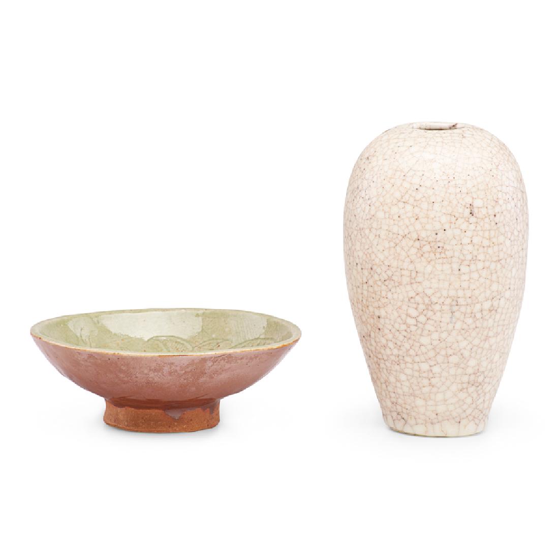 RENE BUTHAUD Vase and small dish: RENE BUTHAUD (1886 - 1986) Peau-de-serpent (snakeskin) glaze vase and small celadon dish with mermaid, France Glazed stoneware and earthenware Each signed RB 6 1/2" x 3 1/2", 2" x 6" dia. Provenance: