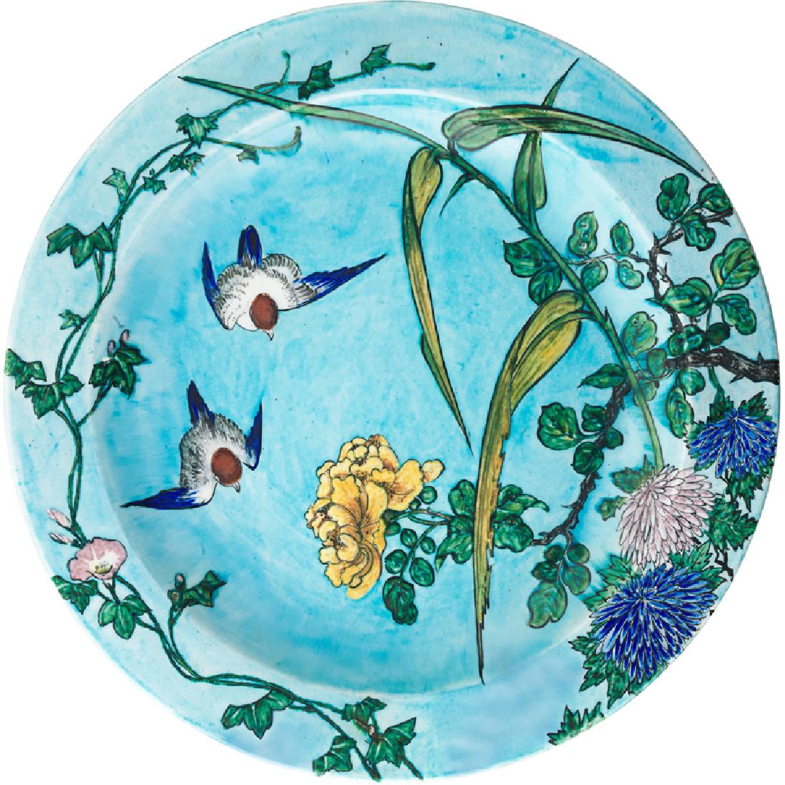 THEODORE DECK Japonesque charger: THEODORE DECK (1823 - 1891) Wall-hanging charger with Japonesque decoration of swallows and flowers, France, 1880s Glazed earthenware Stamped TH DECK 2" x 16" dia. Provenance: Collection of Robert A E