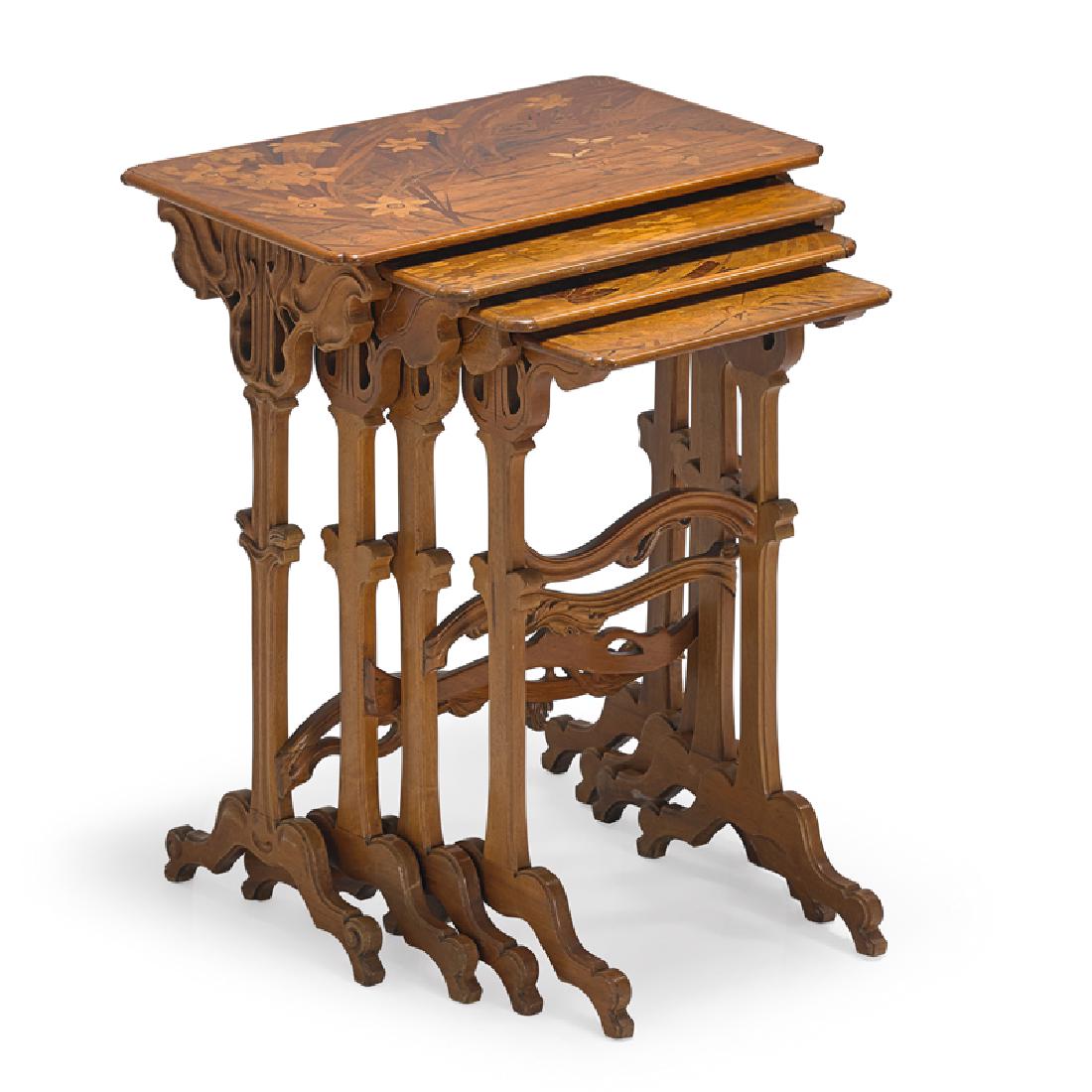 GALLE Set of four nesting tables: GALLE Four marquetry nesting tables depicting flowers, butterflies, maple leaves, and a heron, France, ca. 1900 Beech, mixed wood inlay Inlaid signature to largest Largest: 30" x 24" x 15 1/2"