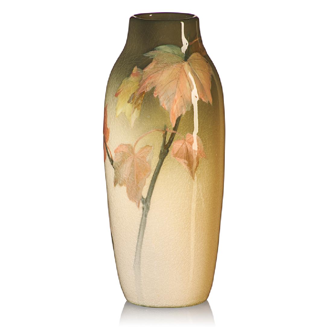 ROOKWOOD Iris Glaze vase: JOSEPHINE ZETTEL (1874 - 1954) ROOKWOOD Iris Glaze vase with maple leaves, Cincinnati, OH, 1902 Flame mark/II/932D/JZ/W 8 3/4" x 3 1/2" Provenance: Rago Auctions