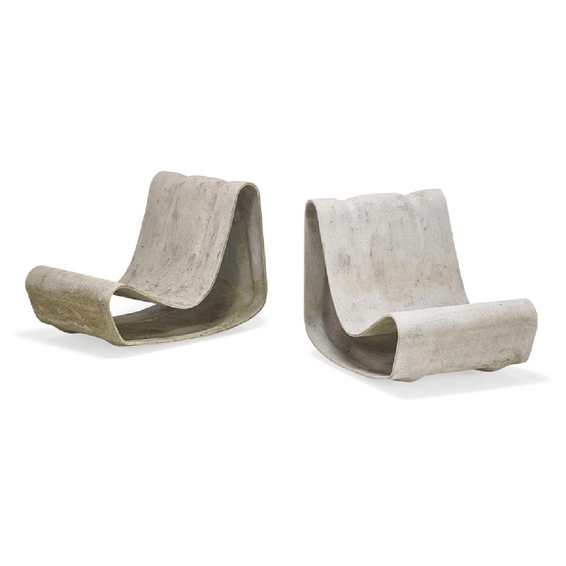 WILLY GUHL Pair of lounge chairs: WILLY GUHL (1915 - 2004) ETERNIT AG Pair of lounge chairs, Switzerland, des. 1954, manuf. 21st C. Concrete composite Stamped signature 24" x 21" x 33"