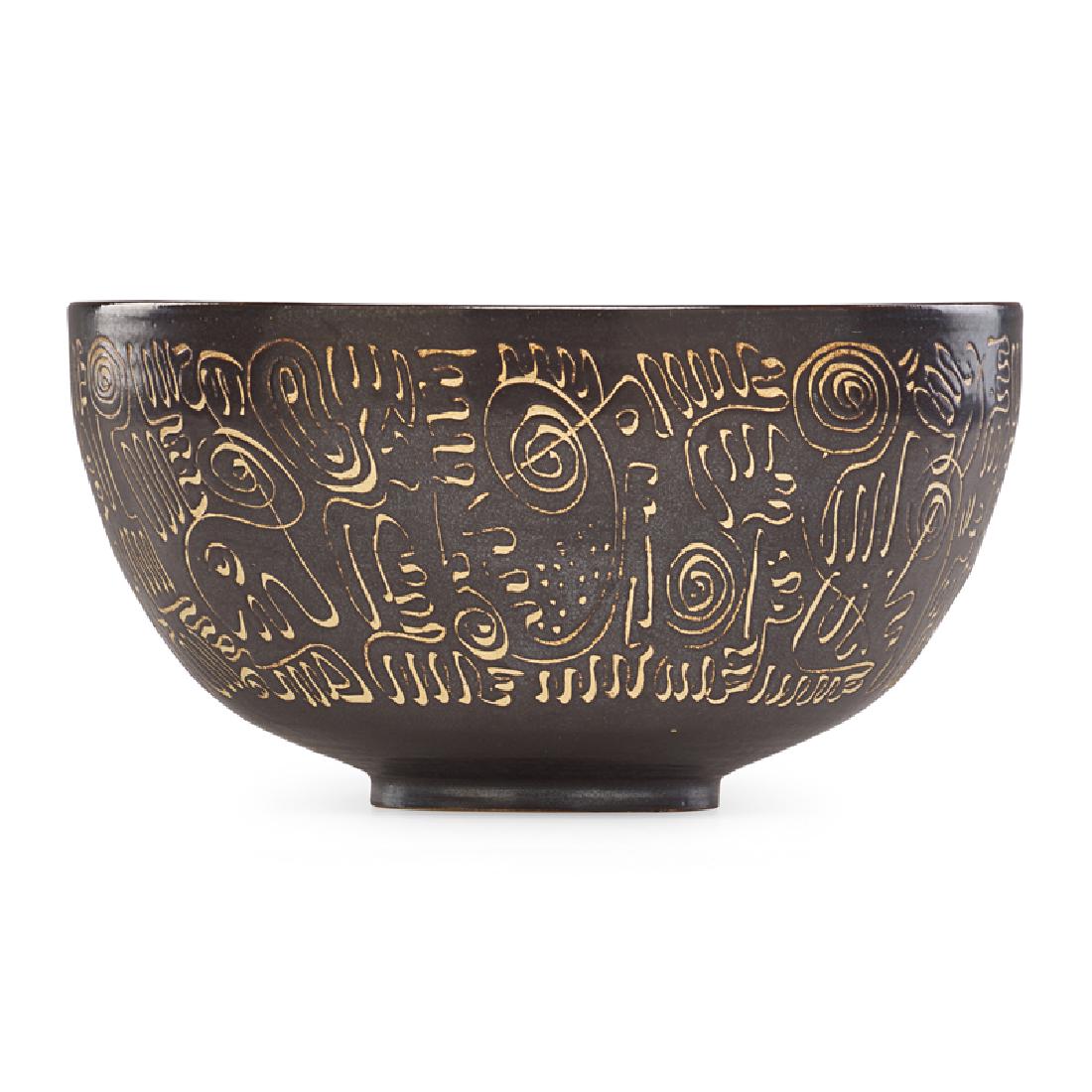 EDWIN & MARY SCHEIER Large and early bowl: EDWIN SCHEIER (1910 - 2008) MARY SCHEIER (1908 - 2007) Large and early bowl with abstract design, mid-20th C. Glazed earthenware Signed 5 1/4" x 10"