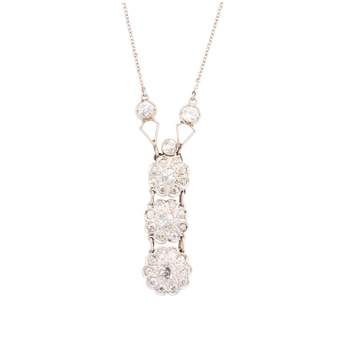 EDWARDIAN DIAMOND NECKLACE: With three OEC diamond platinum-topped 14k yellow gold clusters, approx. 2.32 cts.TW., on platinum cable link chain. Ca. 1910. 1 1/2", 16". 4.6 dwt.
