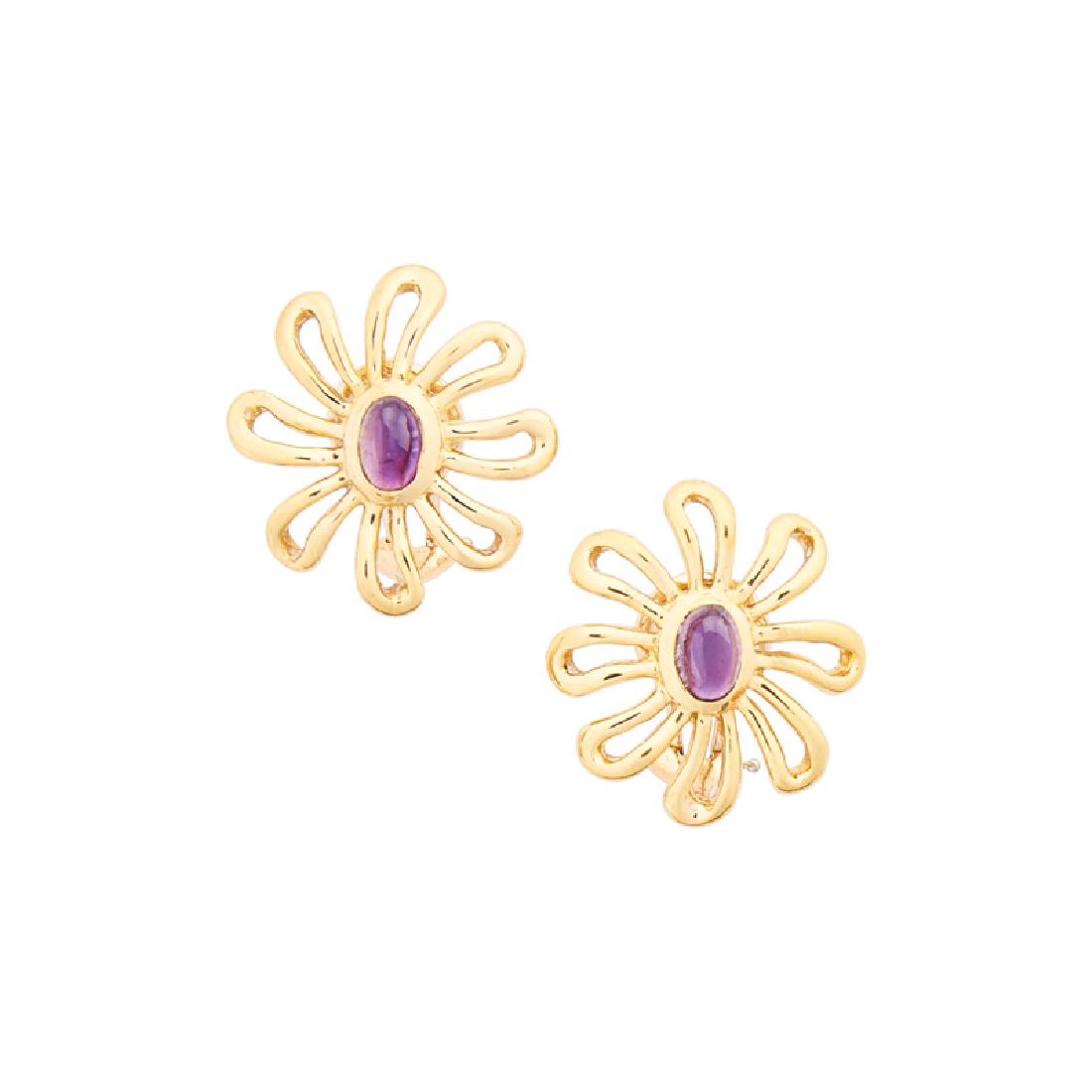 PALOMA PICASSO, TIFFANY & CO. AMETHYST FLOWER HEAD: Each a steep oval amethyst cabochon, centered by open form petals. 18k. Stamped by the maker. 7/8". 5.9 dwt.