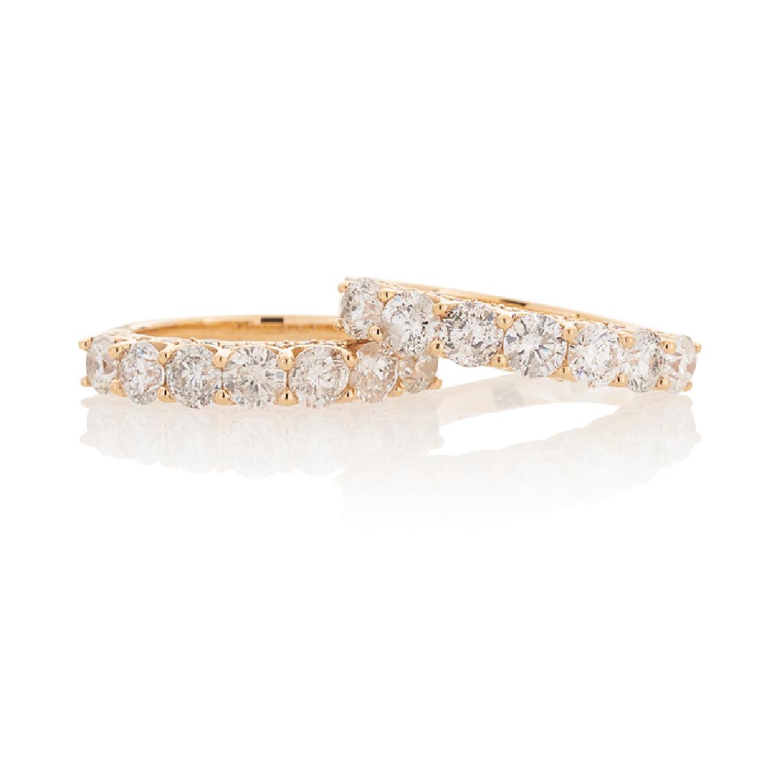DIAMOND & YELLOW GOLD STACKING RINGS: The two bands with prong-set RBC diamonds, above a scalloped diamond gallery, approx. 2.85 cts. TW. 14k Size 6. 5.0 dwt.