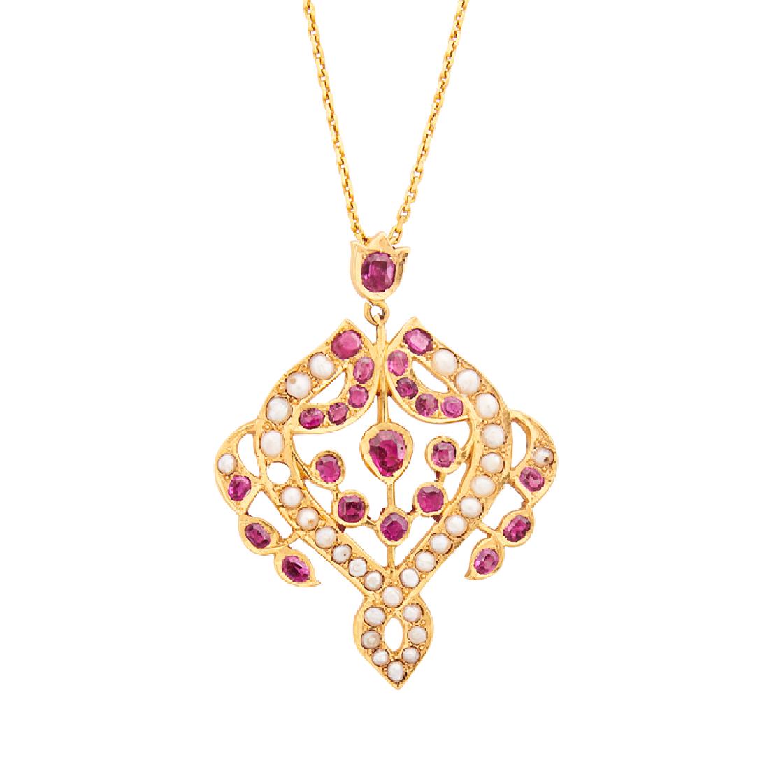 RUBY, SEED PEARL & YELLOW GOLD PENDANT NECKLACE: The open form pendant with oval-faceted rubies and seed pearl, on modified cable link chain. 22k. 1 3/4" x 1 5/8" x 18". 9.4 dwt.