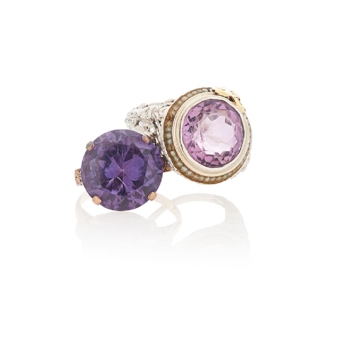 AMETHYST OR SYNTHETIC ALEXANDRITE RINGS: The two rings with round-faceted amethyst in foliate 18k white gold or synthetic alexandrite in scrolling 14k yellow gold. Sizes 7, 5 1/2. 6.1 dwt.