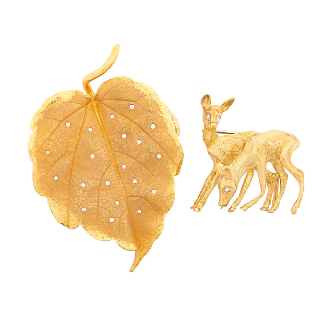 WHIMSICAL DIAMOND & YELLOW GOLD BROOCHES: An F. J. Cooper 18k fawn with single-cut diamond eyes, approx. .02 ct. TW.; A realistically rendered 14k birch leaf inset with single-cut diamonds, approx. .10 ct. TW. Stamped by the makers. 1 1/8" x