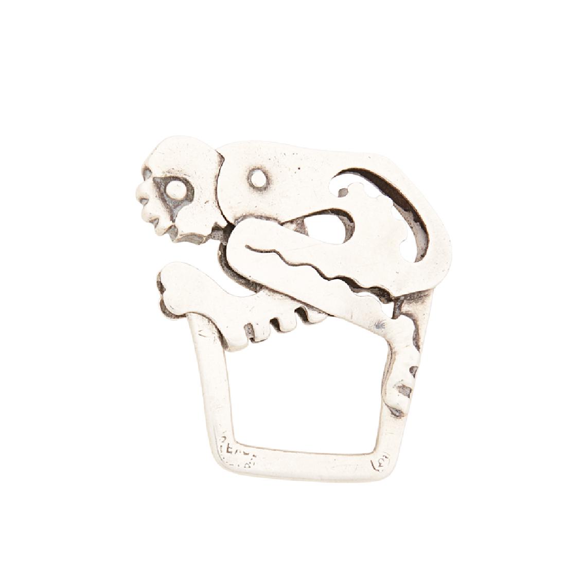 SPRATLING STERLING MONKEY KEY FOB: Designed in the Glyptic style. Stamped with obscured maker's and control marks. 1 1/2" x 1 1/2". 17.0 gs.