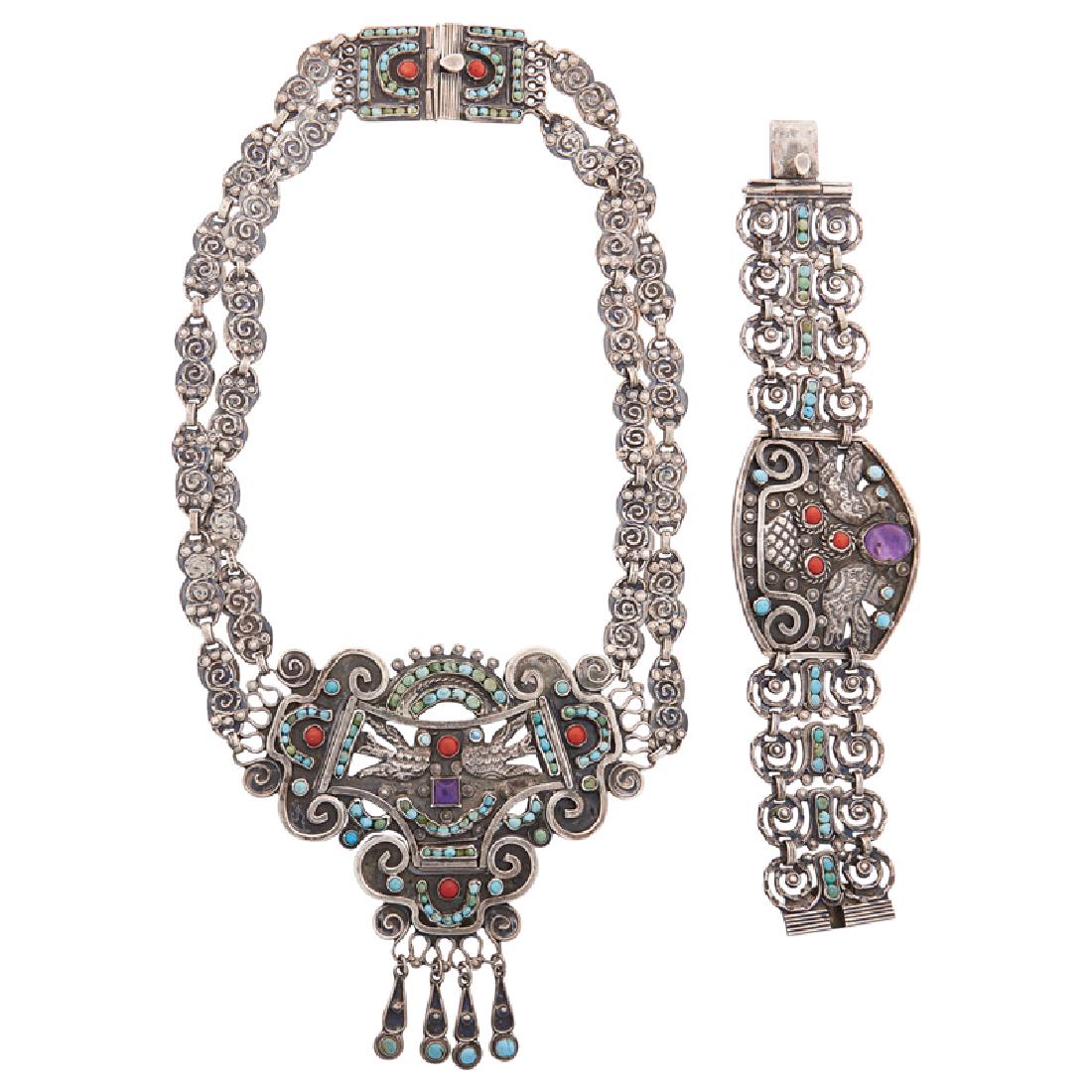 STERLING NECKLACE & BRACELET, STYLE OF MATILDE POULAT: A panel with central amethyst, centered by sparrows, rows of round turquoise cabochons and coral accents, on scrolling hand hammered links joining a panel. Stamped by the maker. 18", 7". 169.3 gs.