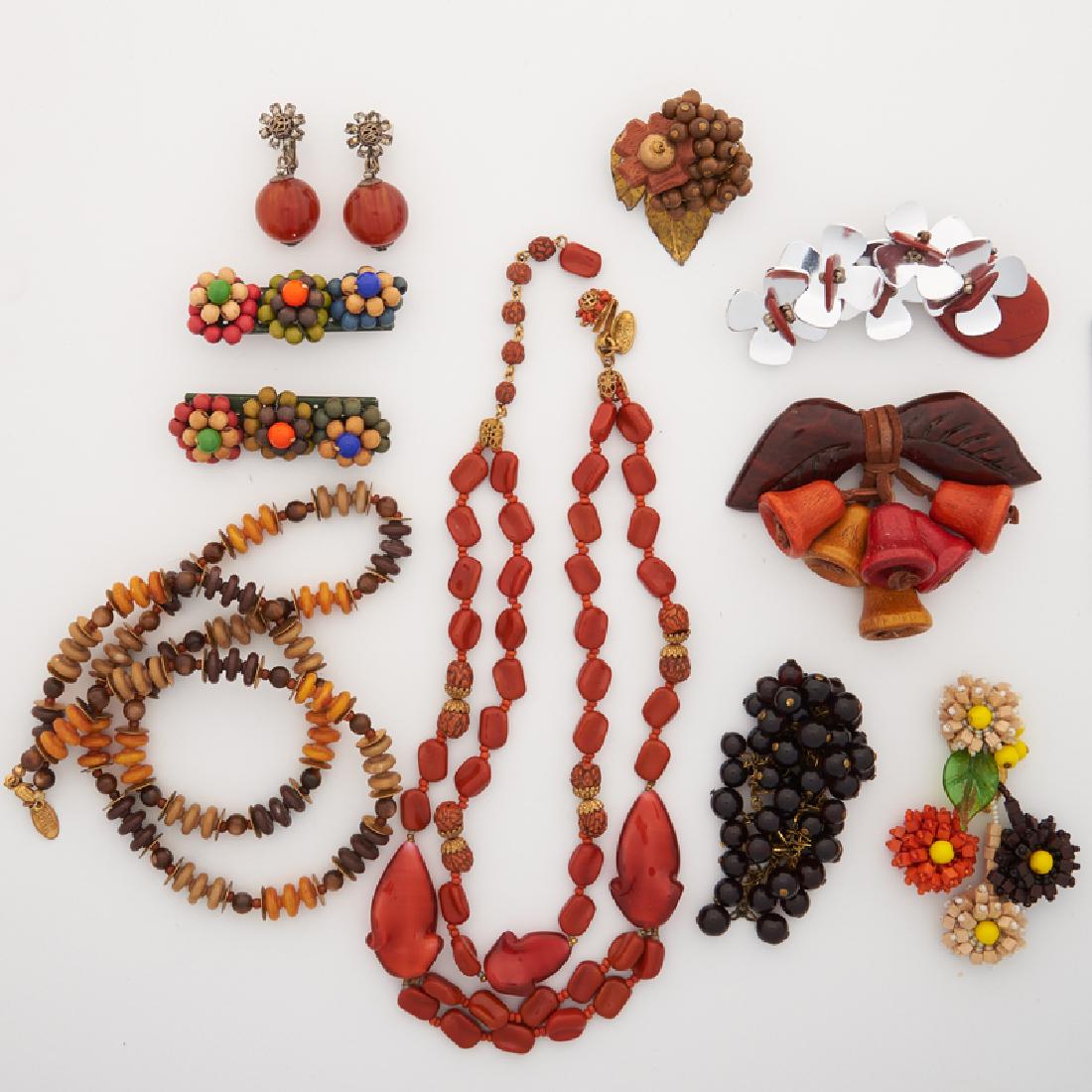 MIRIAM HASKELL WOOD OR IMITATION AGATE COSTUME JEWELRY: Comprising a pair of early unsigned bar brooches with colorful wood bead clusters, ca. 1920; An early unsigned floral clip brooch with cube carved wood beads, ca. 1930; An early unsigned carved wood f