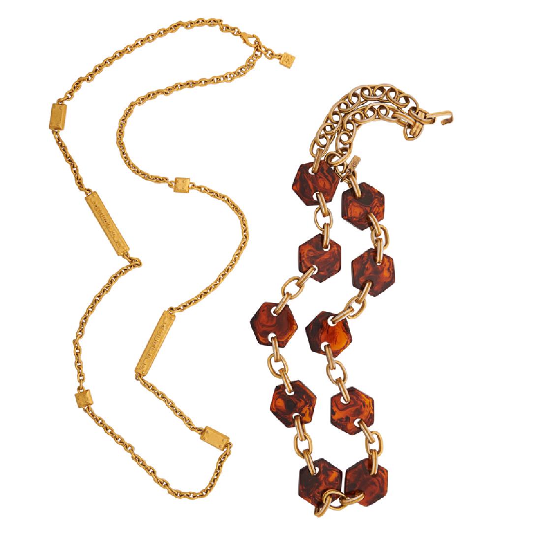 YVES SAINT LAURENT OR KARL LAGERFELD NECKLACES: The gold-tone metal cable link chains with resinous "tortoise shell" or gold-tone logo stations. 38", 46".