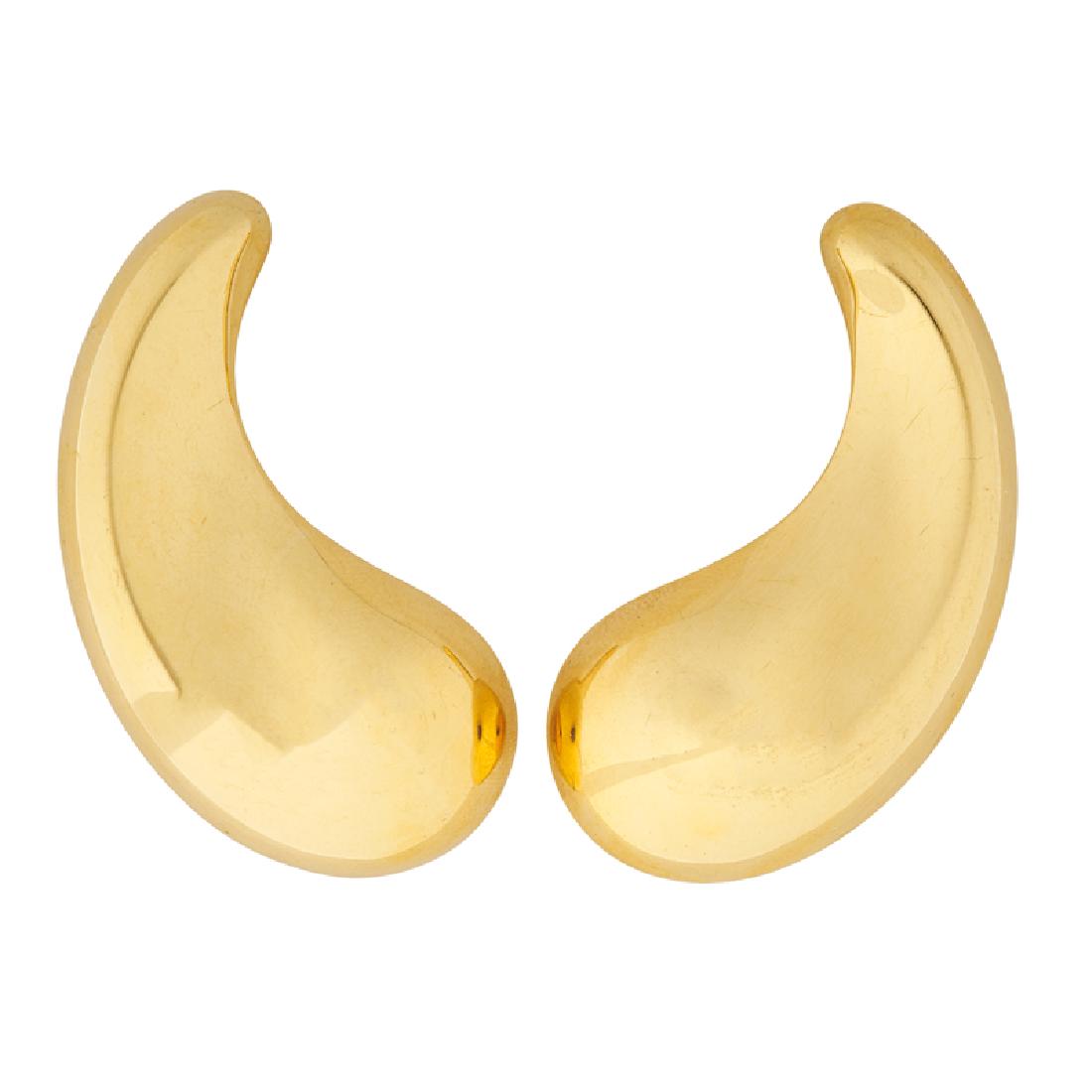 ELSA PERETTI, TIFFANY & CO. GOLD "TEARDROP" EAR CLIPS: 18k. Stamped by the maker, Spain. 2"". 11.1 dwt. With original pouch and packer.