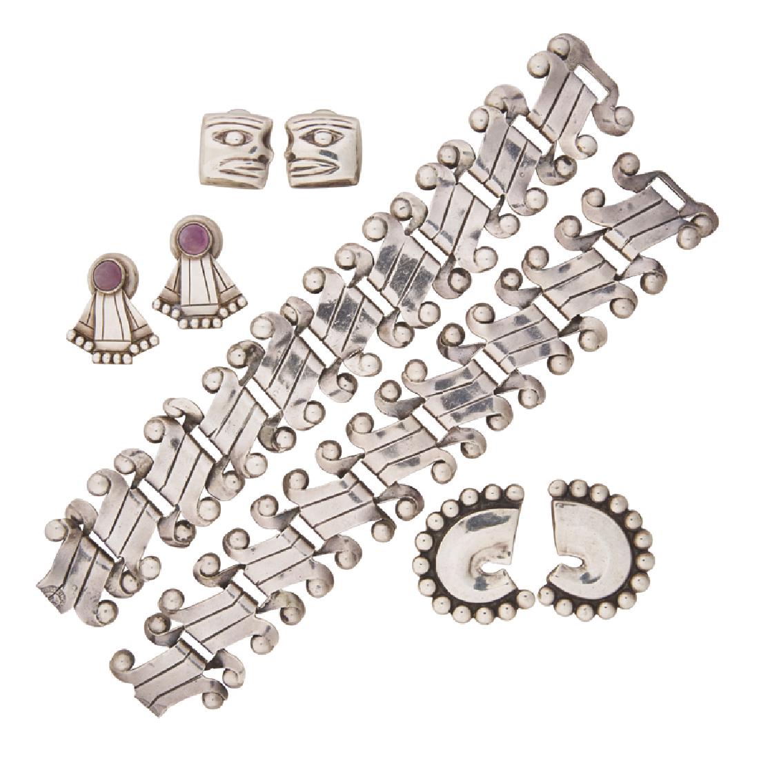 SPRATLING OR LOS CASTILLO SILVER JEWELRY: Comprising a pair of Spratling link bracelets, a pair of ribbon earrings with round amethyst cabochons and a pair of figural earrings; A pair of Los Castillo scalloped earrings. 1939-1948. Stamped by